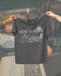 Read in Peace Skeleton Reader Graphic Tee