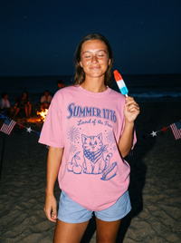 Summer 1776 Land of the Free patriotic kitten tee in pink, beach summer night with sparklers